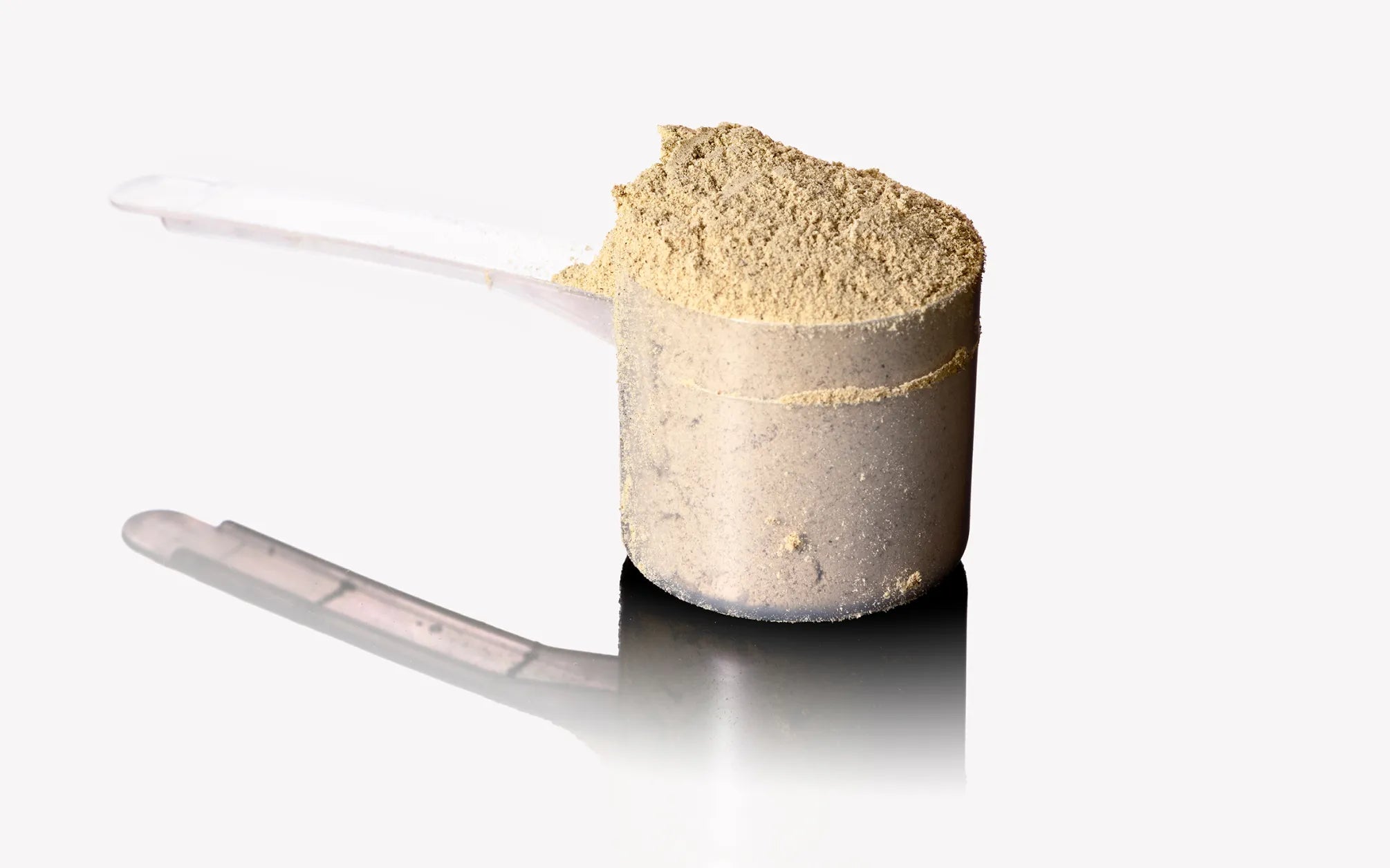 A rounded scoop of HEAL plant based nutrition.