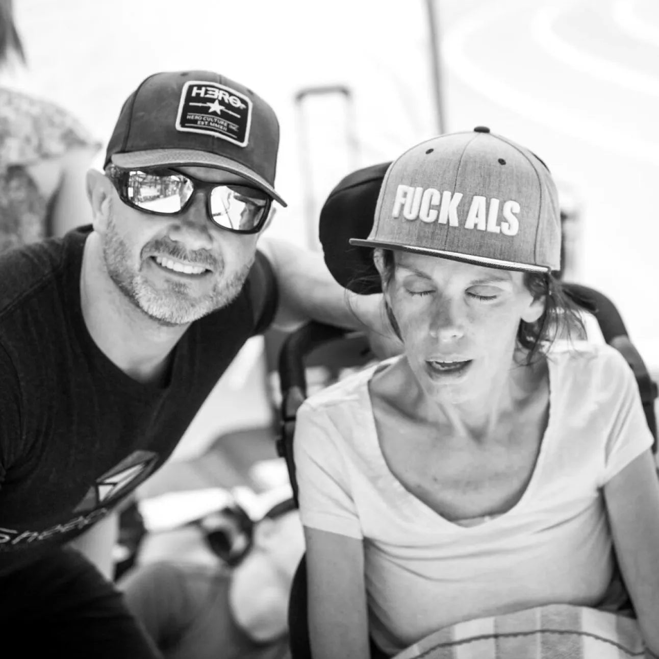 A black and white photo of Paul and his late wife, Linda, wearing a hat.